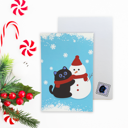 Black Cat and Snowman Christmas Postcard with Envelope – Cute Holiday Postcard for Cat Lovers